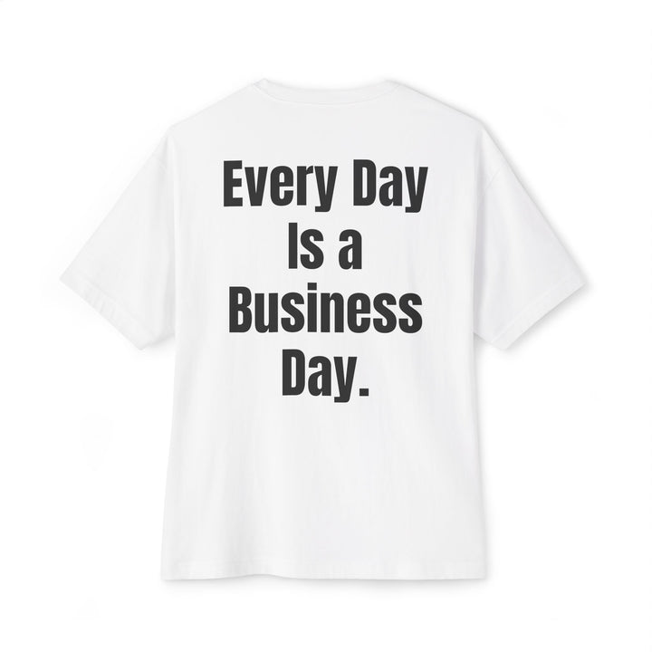 Unisex oversized boxy tee with "Every Day Is a Business Day" slogan, relaxed fit, dropped shoulders, and soft cotton fabric for comfort and style.