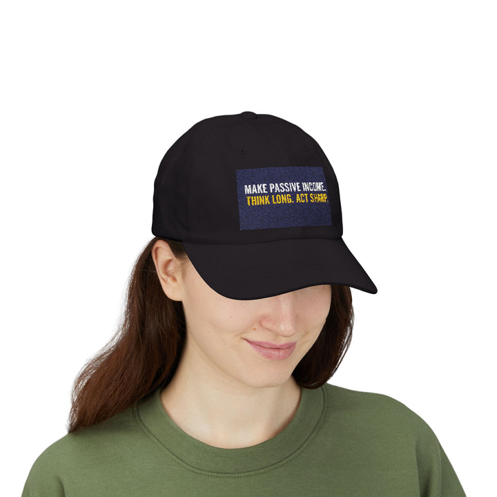 Classic dad cap with motivational slogan "Make Passive Income. Think Long. Act Sharp." embroidered on front, unstructured low-profile fit with antique brass buckle closure.