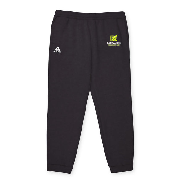 Unisex Adidas fleece joggers with cuffed hems and logo, designed for comfort and eco-friendly everyday athleisure.

