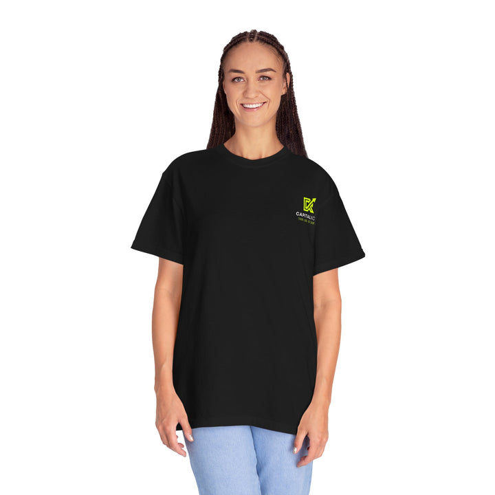 Unisex "Built Different, Paid Different" motivational t-shirt in garment-dyed fabric, offering relaxed fit and unique texture for a stylish, comfortable everyday look.