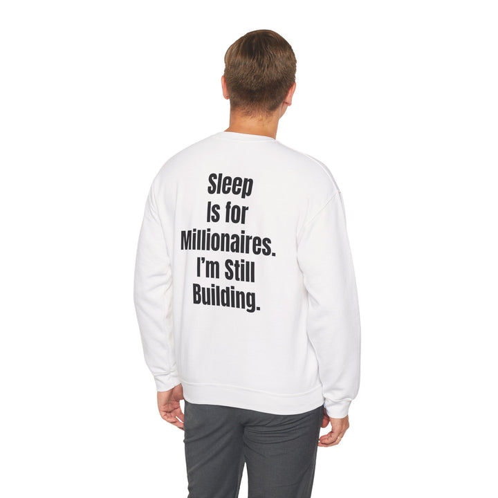 Unisex motivational crewneck sweatshirt with bold back print ‘Sleep Is for Millionaires. I’m Still Building.’ designed for entrepreneurs and goal-setters.