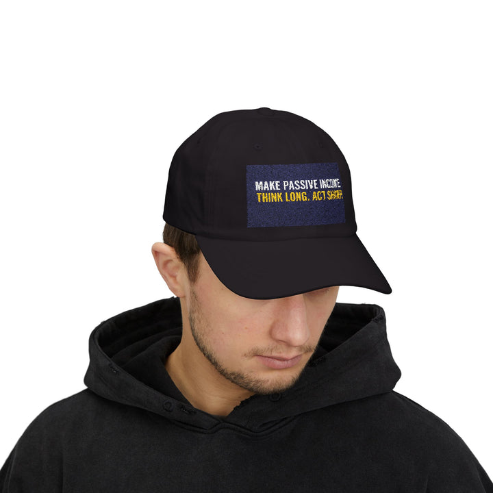 Classic dad cap with motivational slogan "Make Passive Income. Think Long. Act Sharp." embroidered on front, unstructured low-profile fit with antique brass buckle closure.