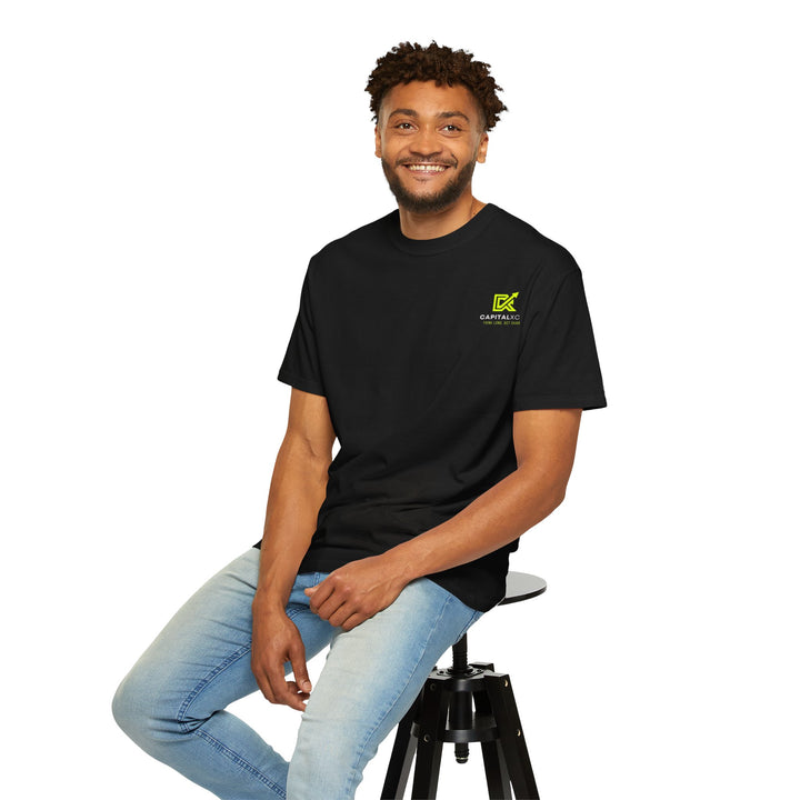 Unisex "Built Different, Paid Different" motivational t-shirt in garment-dyed fabric, offering relaxed fit and unique texture for a stylish, comfortable everyday look.