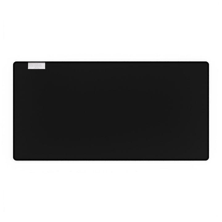 Black motivational desk mat with "Think Long. Act Sharp." slogan, smooth surface for mouse and keyboard use, durable rubber base, and anti-fray edges for long-lasting use.